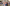 Group of young women posing together with a blurred background of bid day
